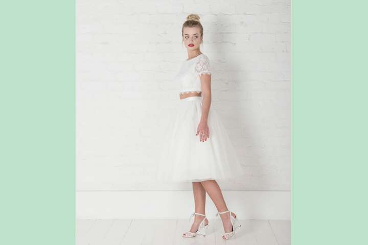Achieve a cutie pie look with the Charlotte Balbier Una thick lace topper and pretty flared Pippapuff-ball short skirt