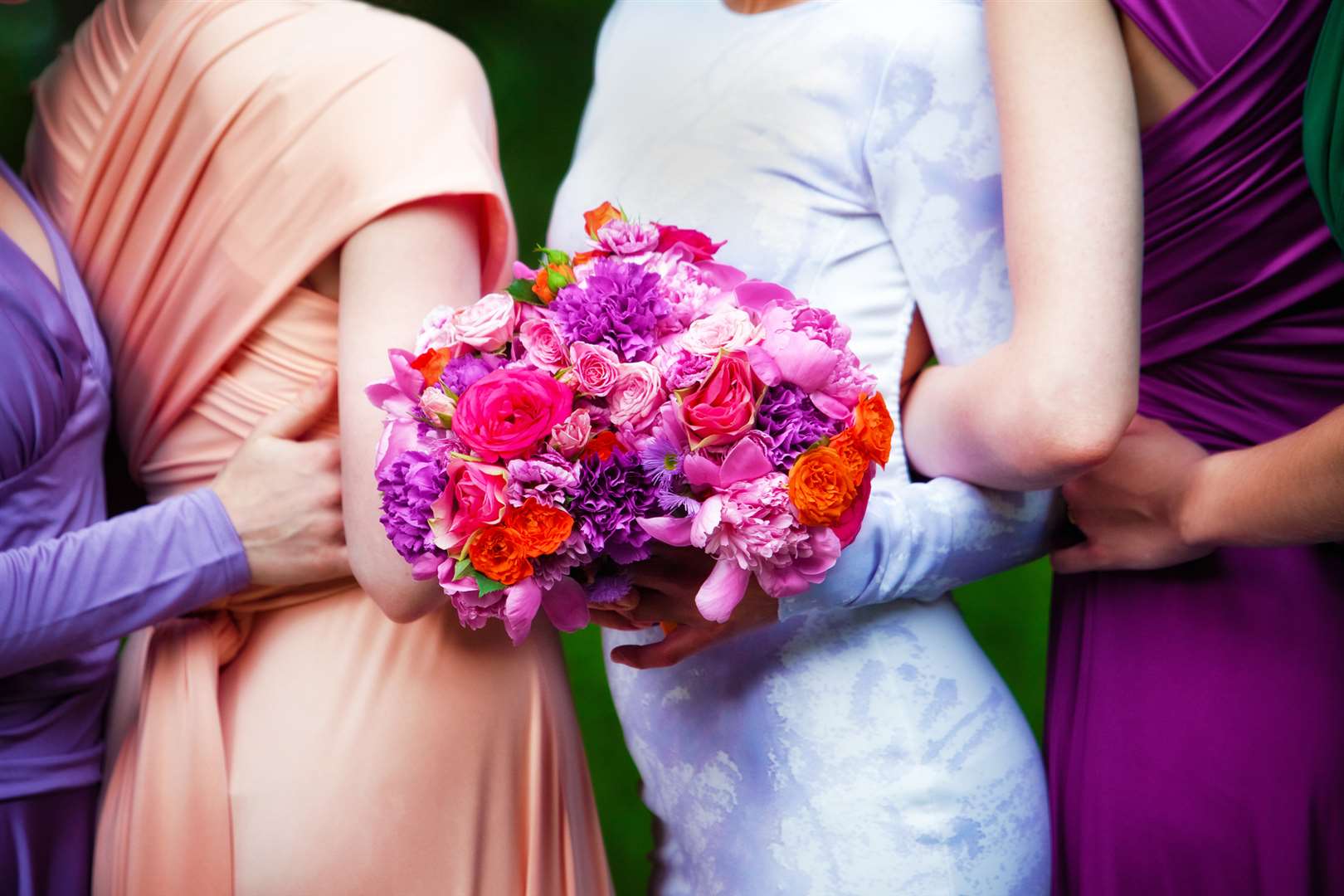 3. You might go for different complementary colours for your bridesmaids’ dresses. You can pull the look together with the bouquets – perhaps picking the same flower varieties in different colours.