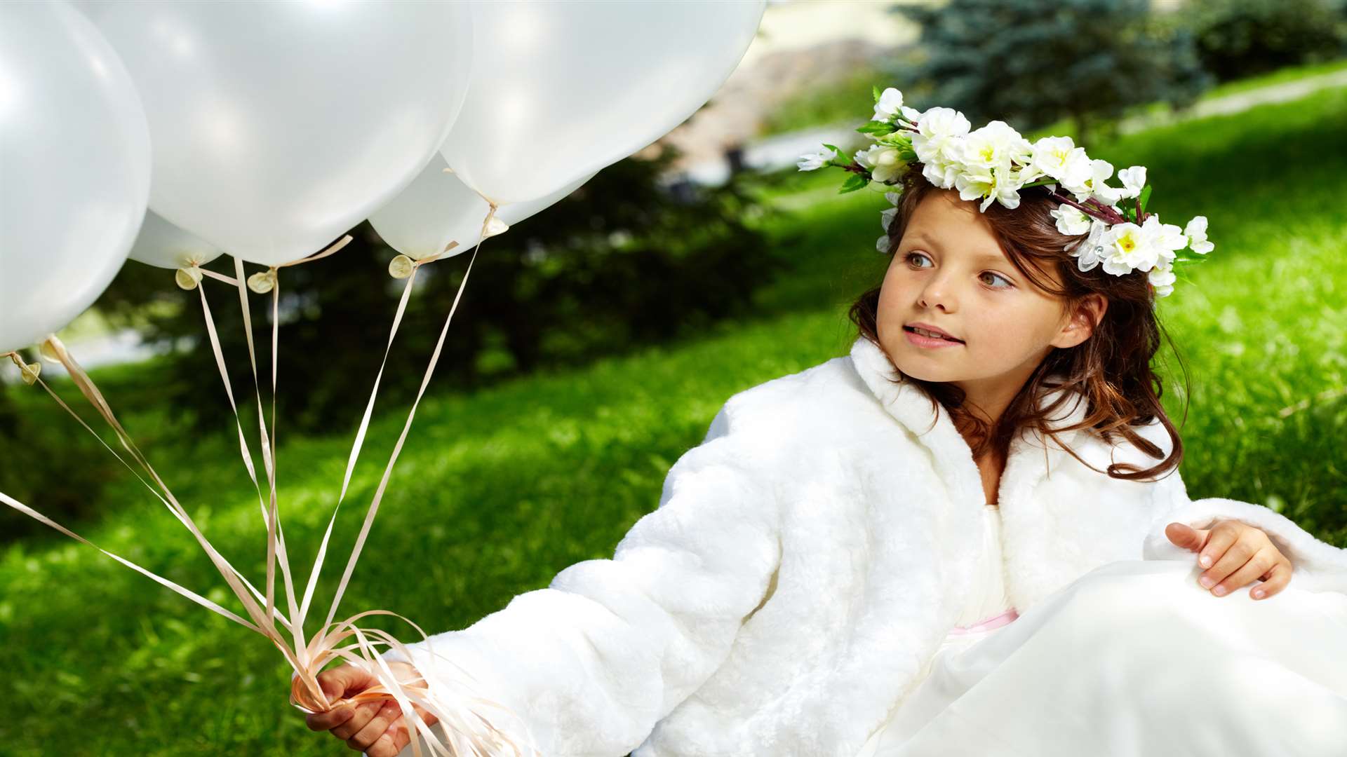 Balloons at a wedding can help distract younger guests!