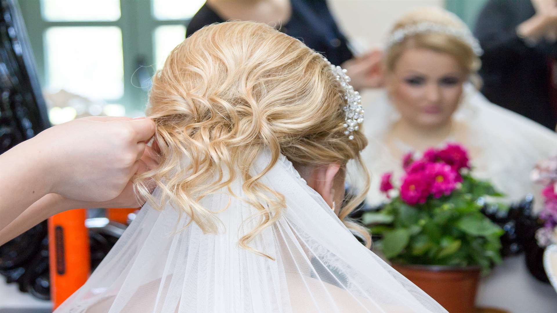 Your hairdresser can help you fix your chosen head dress in place